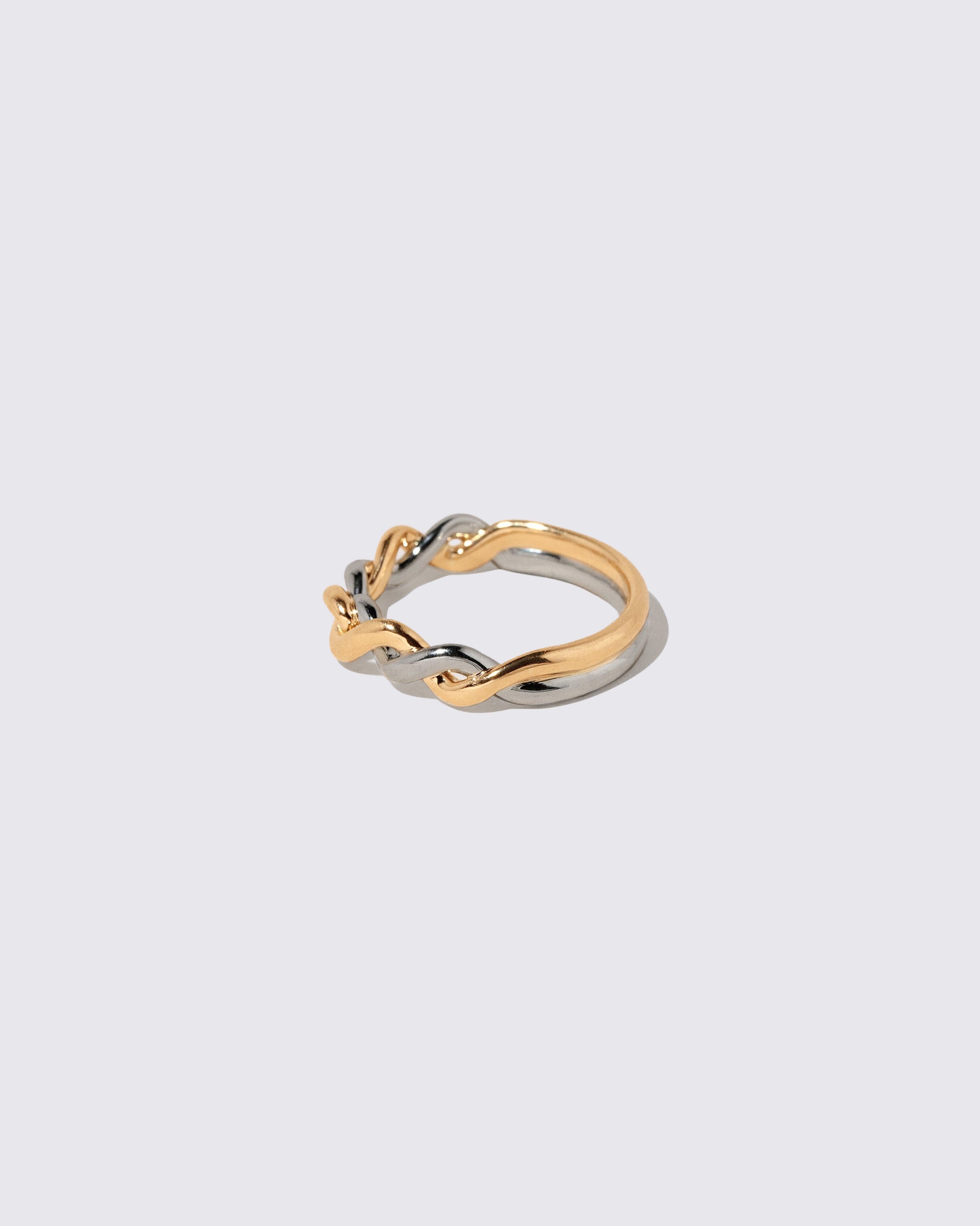 View from the side of the Two Tone Twist Band on light color background.