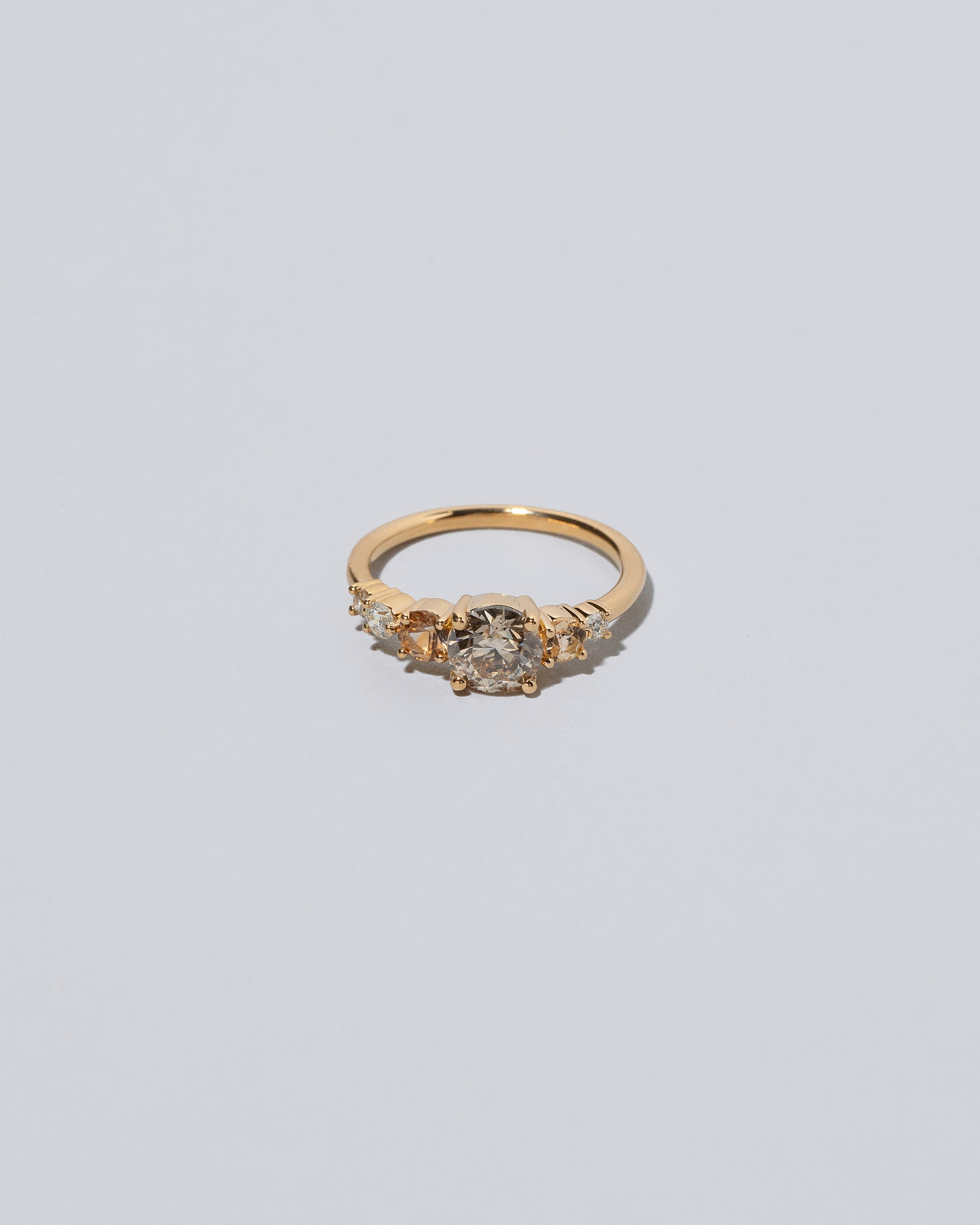 Champagne Diamond Capella Ring on light color background.