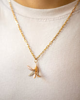 2.2mm Beveled Oval Chain Necklace and Banana Peel Charm on model.