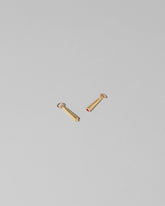 Joint Charm and Lit Joint Charm on light color background.