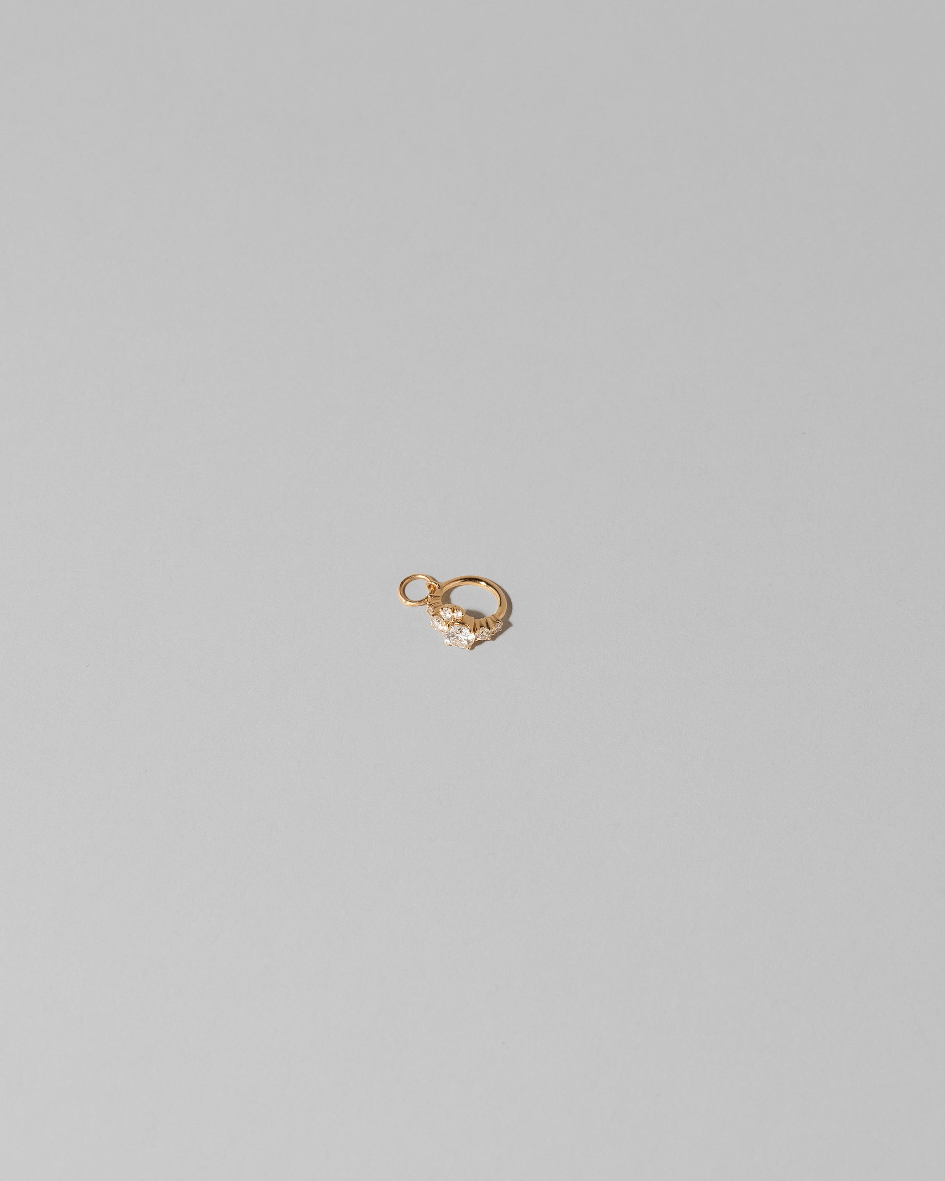 Luna Ring Charm on light color background.