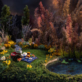 product_details::Styled image of charms from the Small Pleasures Collection, set outside.