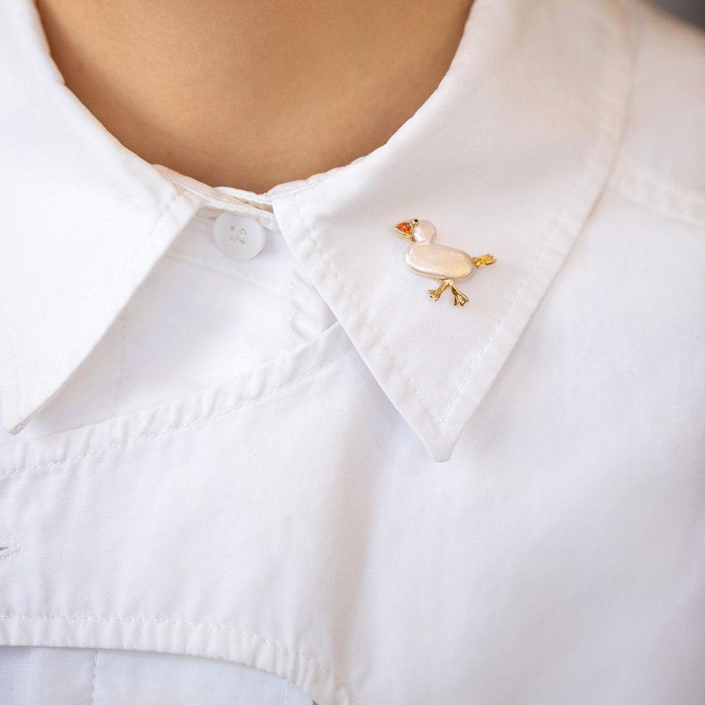 product_details::Henrietta Duck Brooch on model.