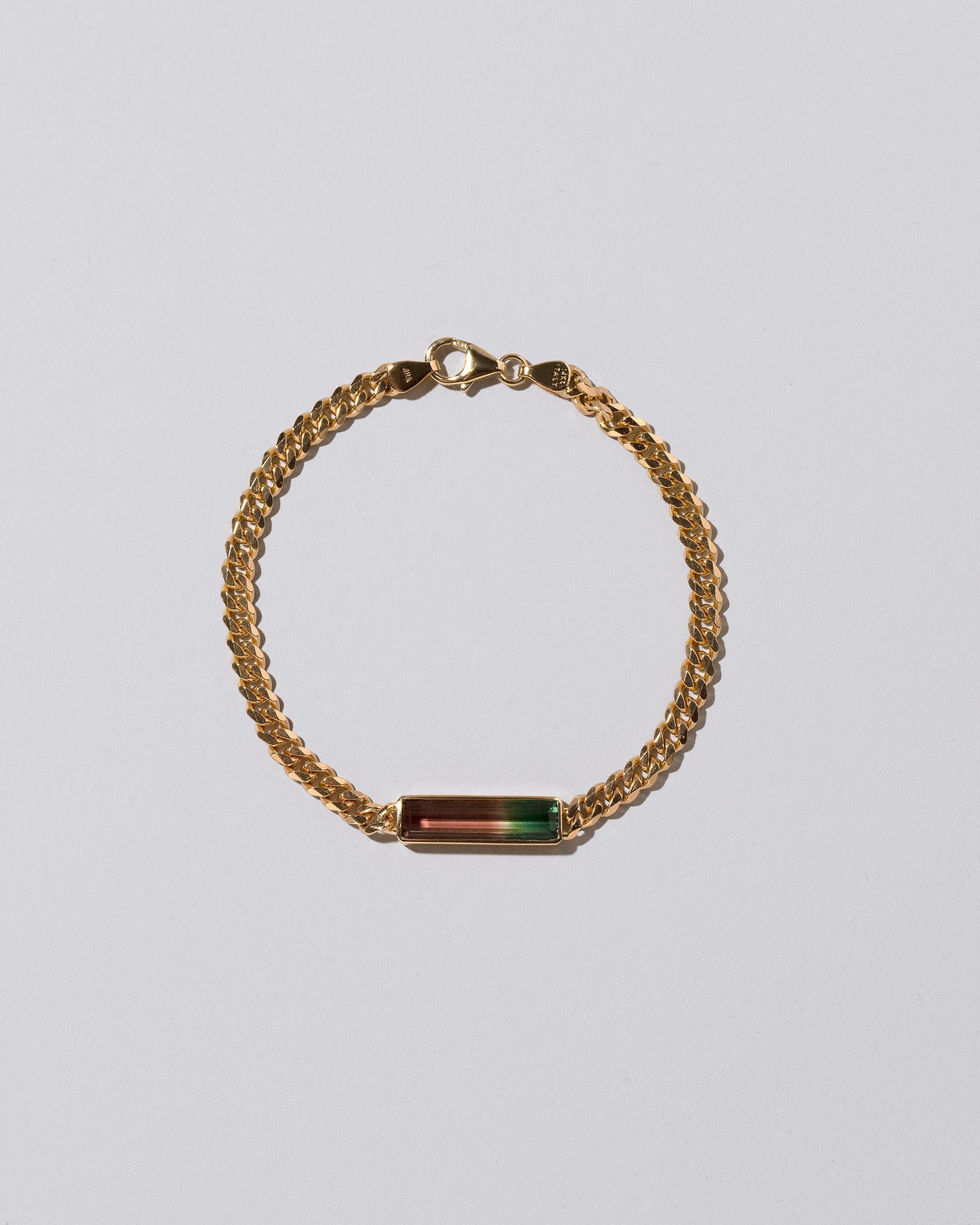 Fluid Bracelet on light color background.