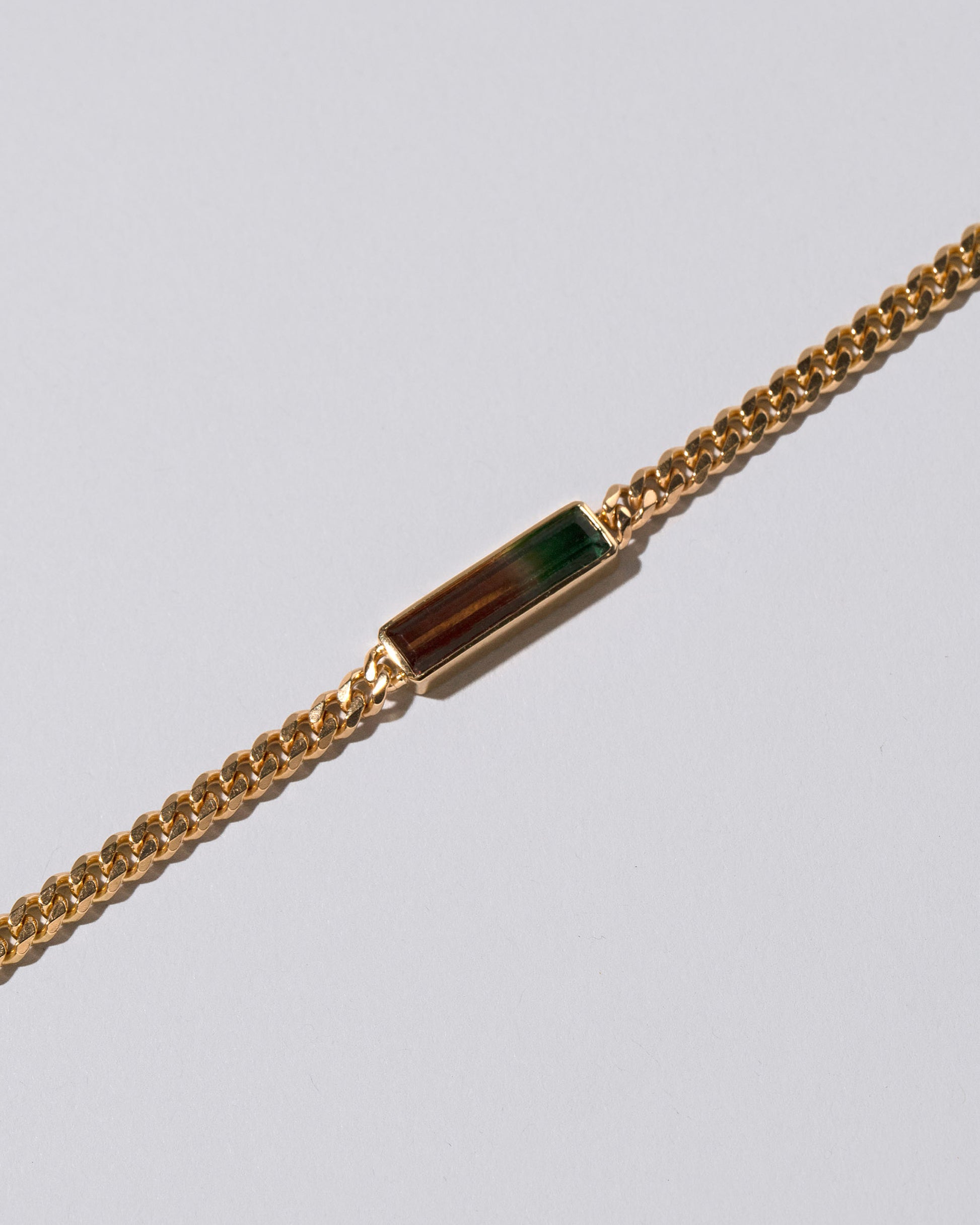 Closeup details of the Fluid Bracelet on light color background.