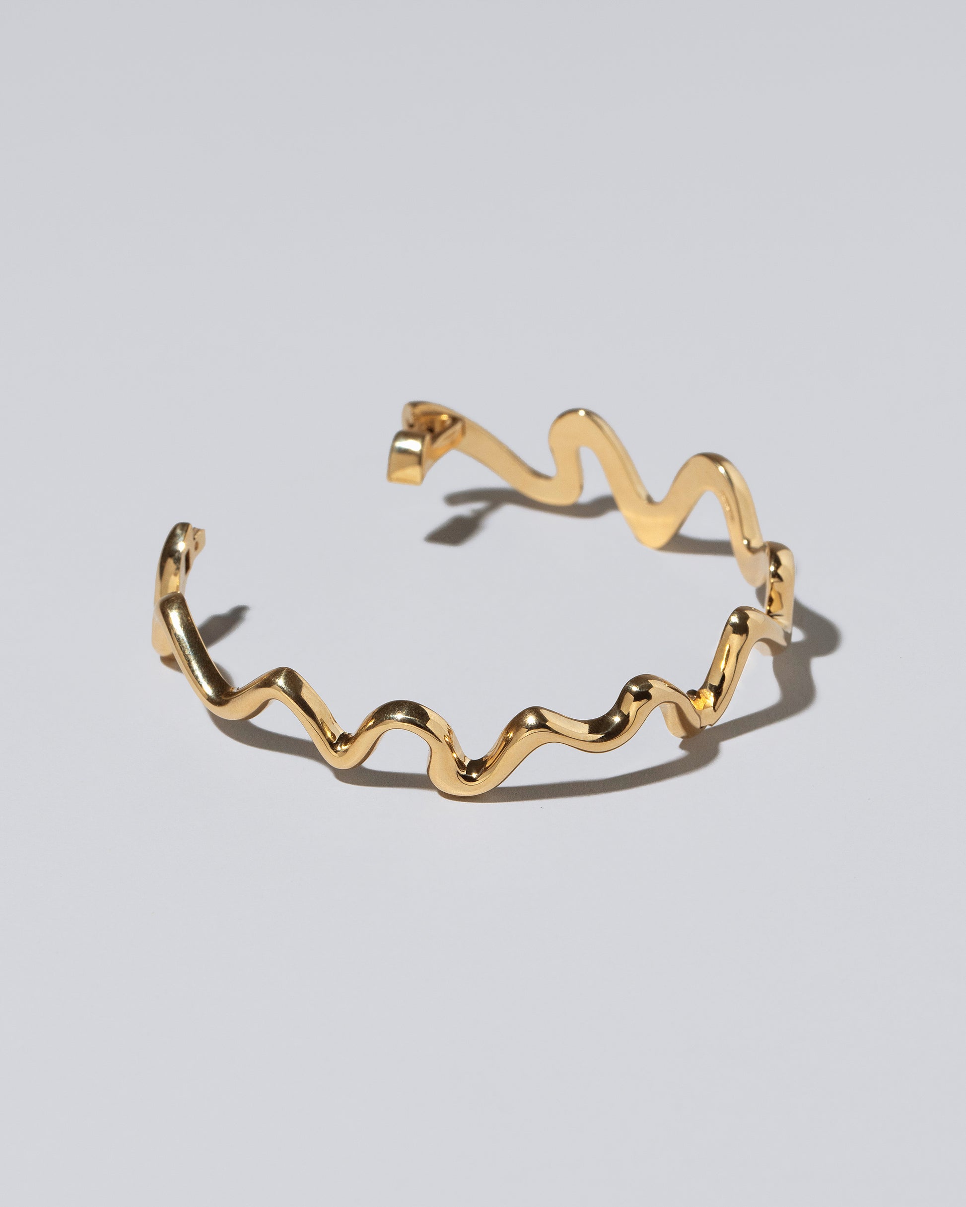 Cut-Outs Bracelet on light color background.