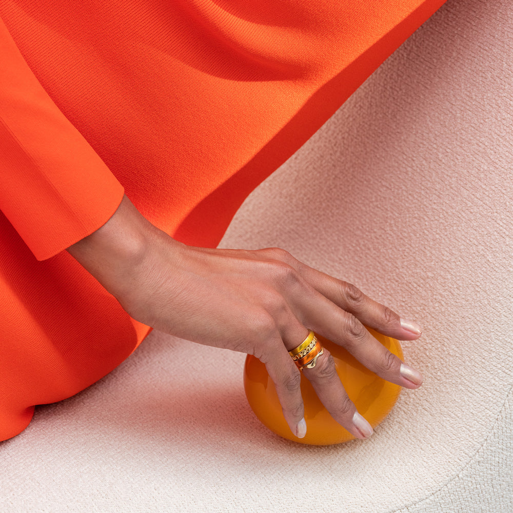 product_details::Styled image of models wearing jewelry from the Cut-Outs Collection.