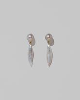 Aphrodite Earrings on light color background.