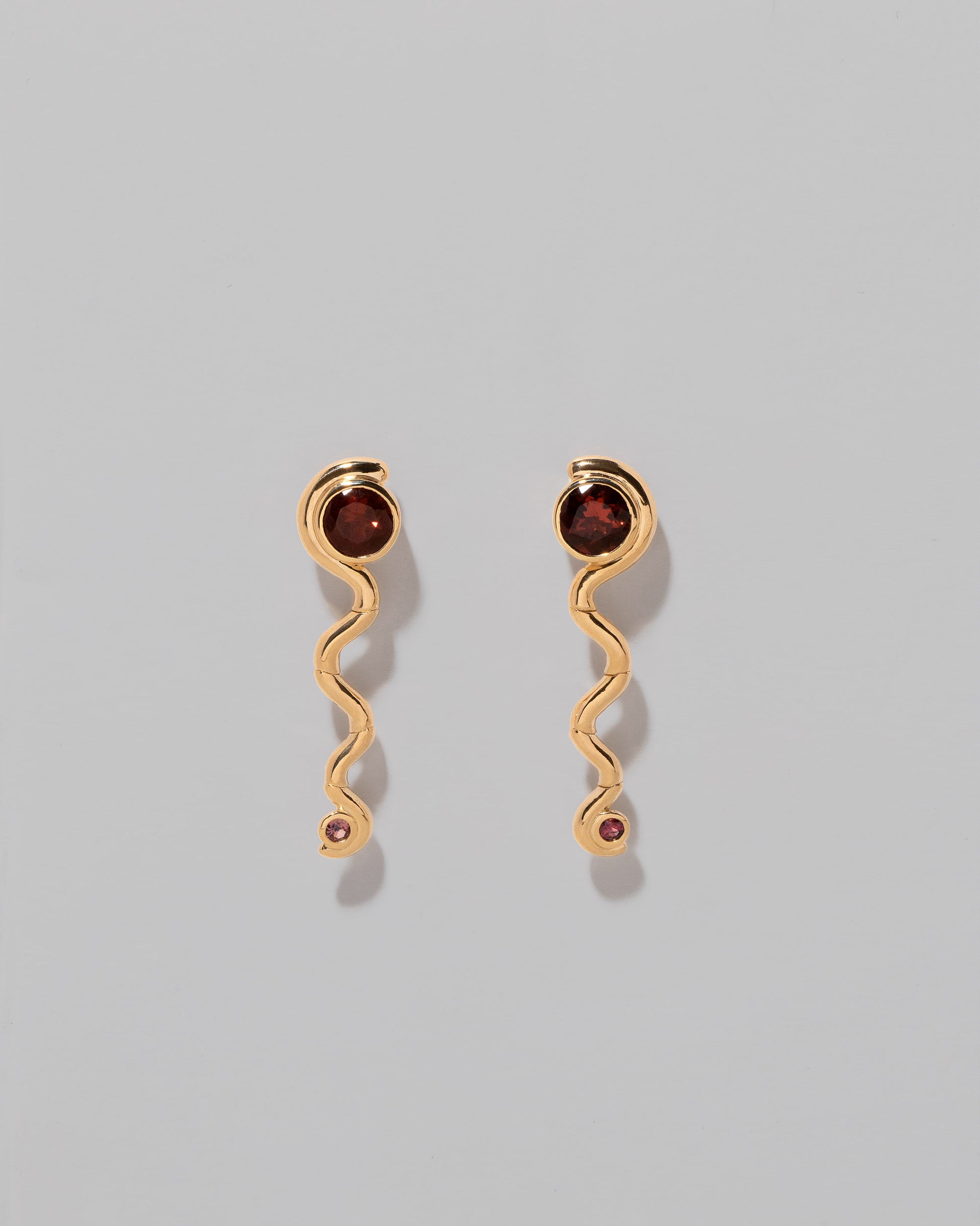 Disa Earrings on light color background