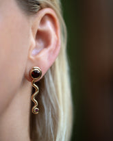 Disa Earrings on model.