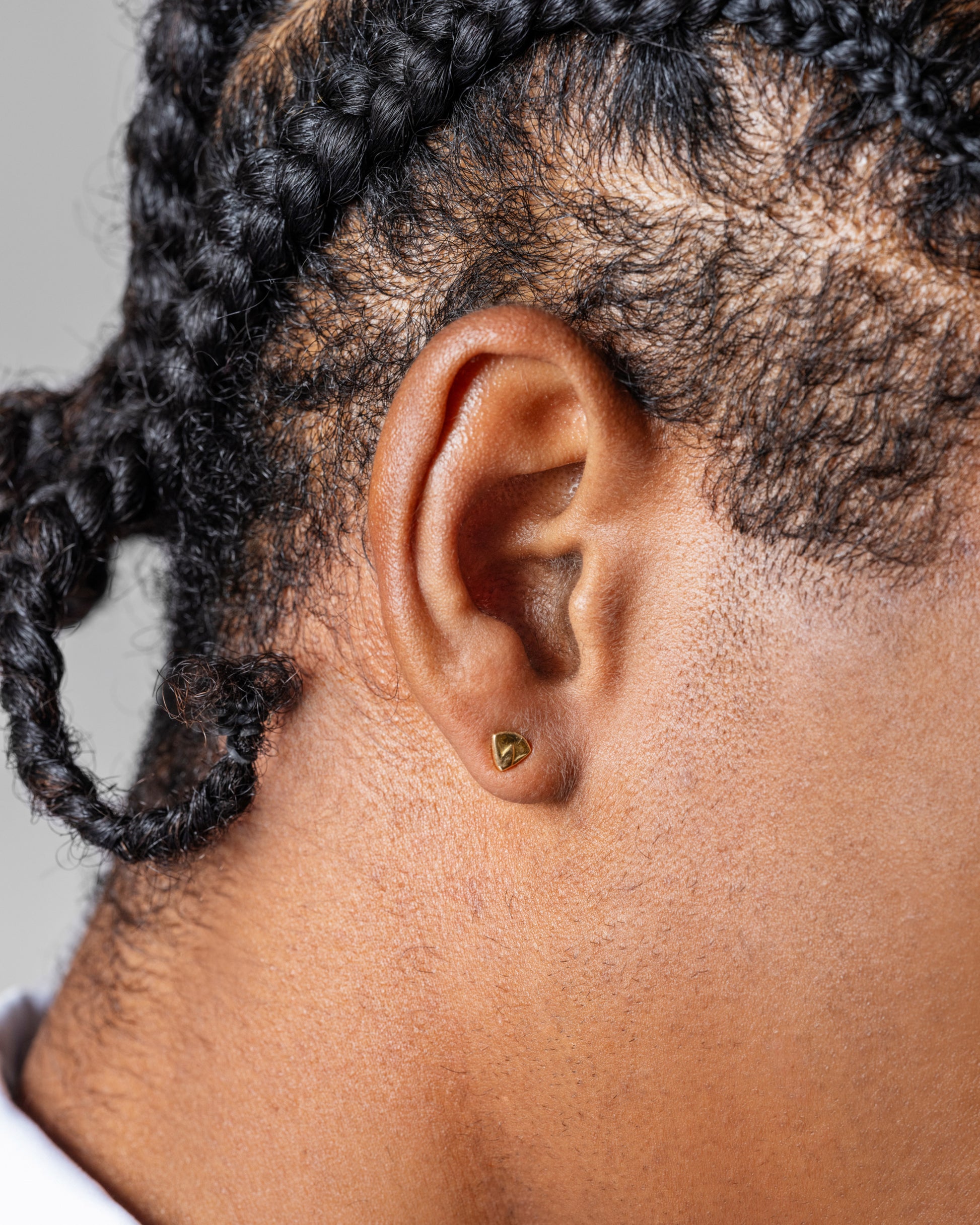 Lotus Blossom Stud Earring Single on male model.