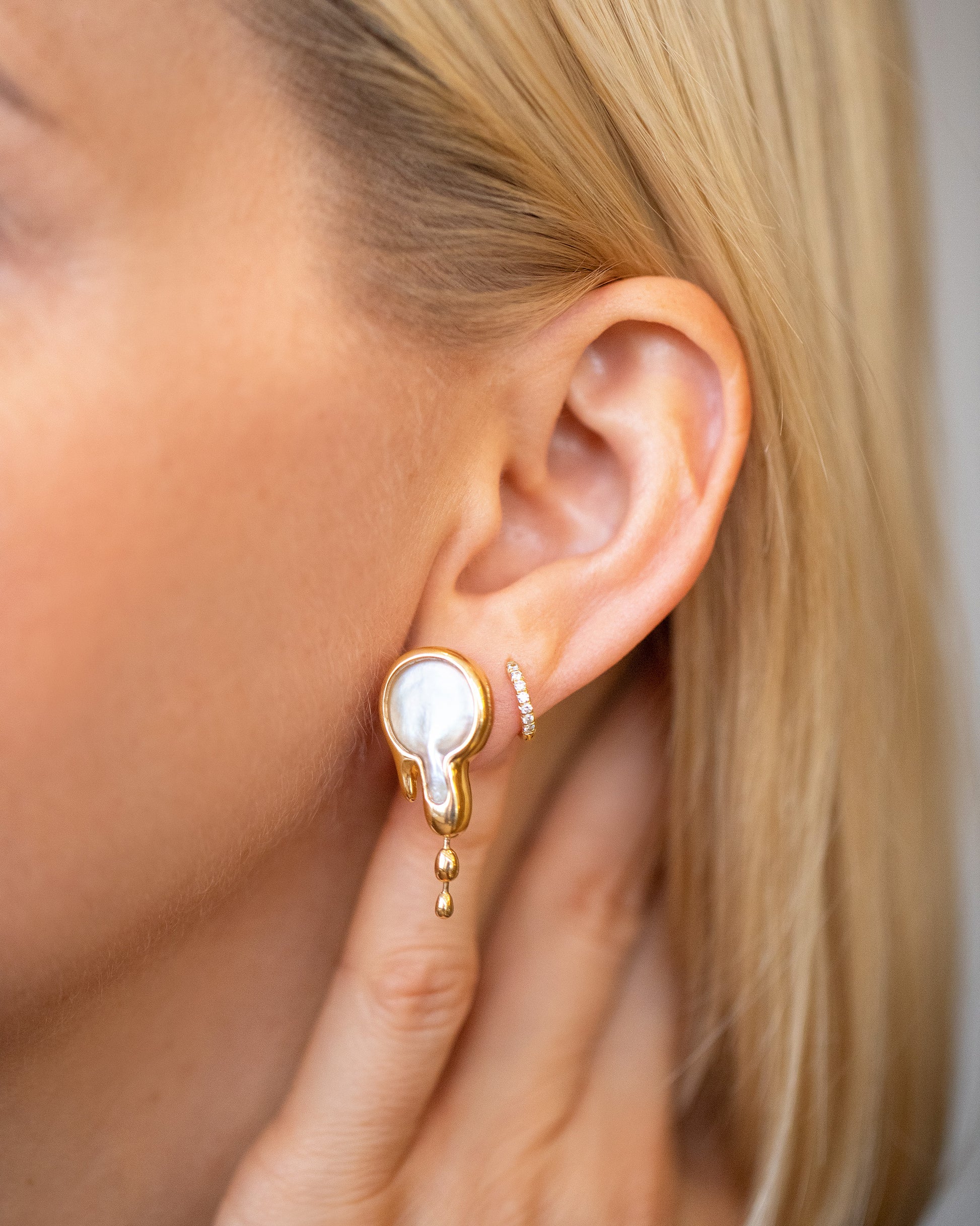 Melt Earrings on model.