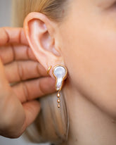 Melt Earrings on model.