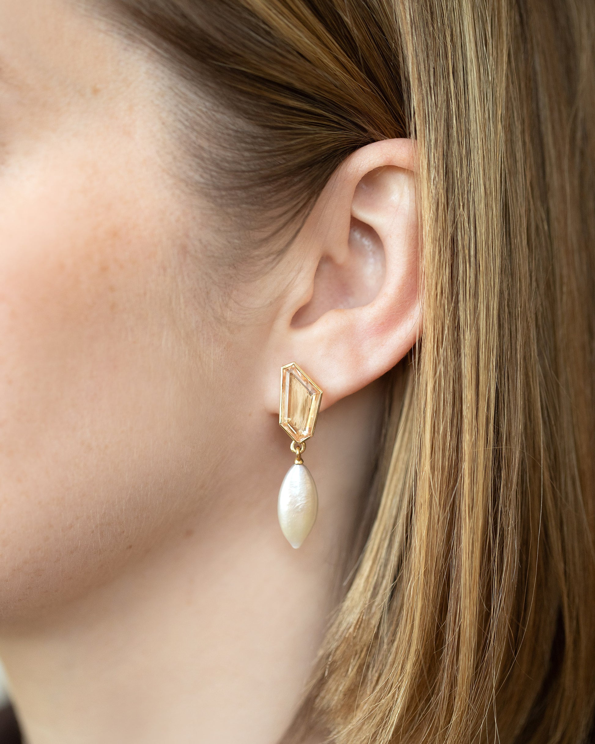 Tricopilia Earrings on model.