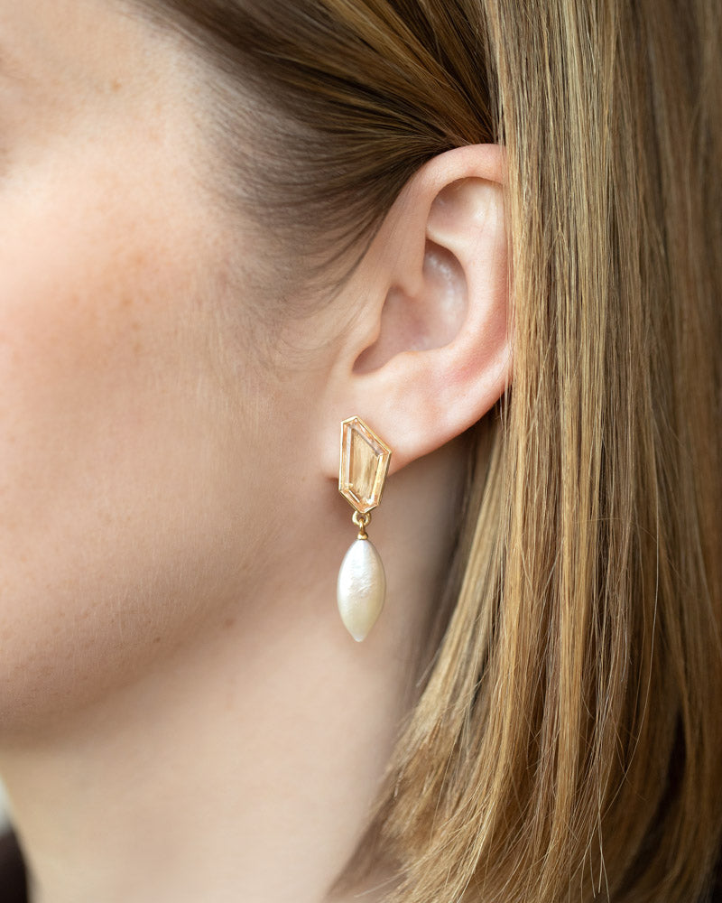 Tricopilia Earrings on model.