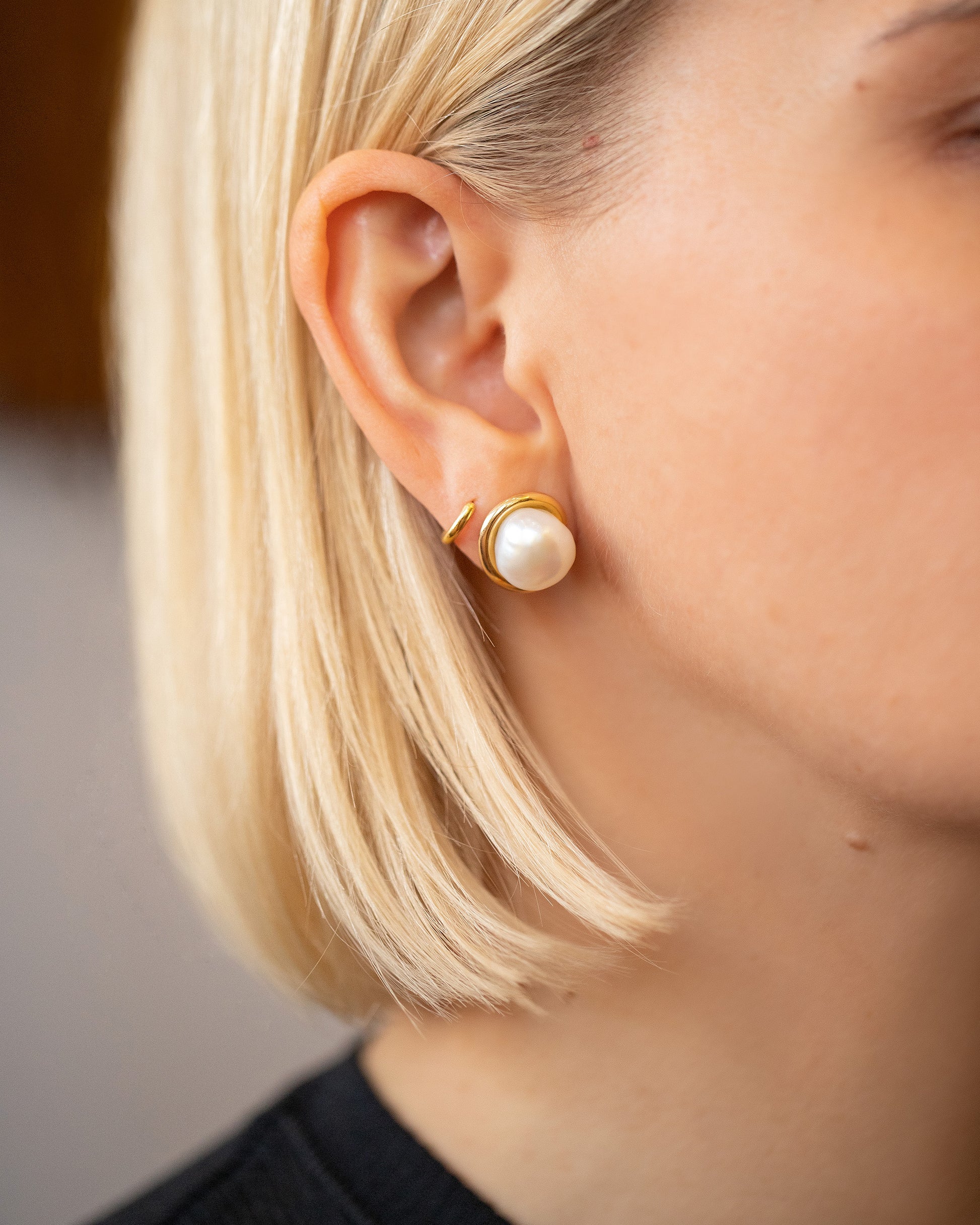 Nereus Earrings on model.