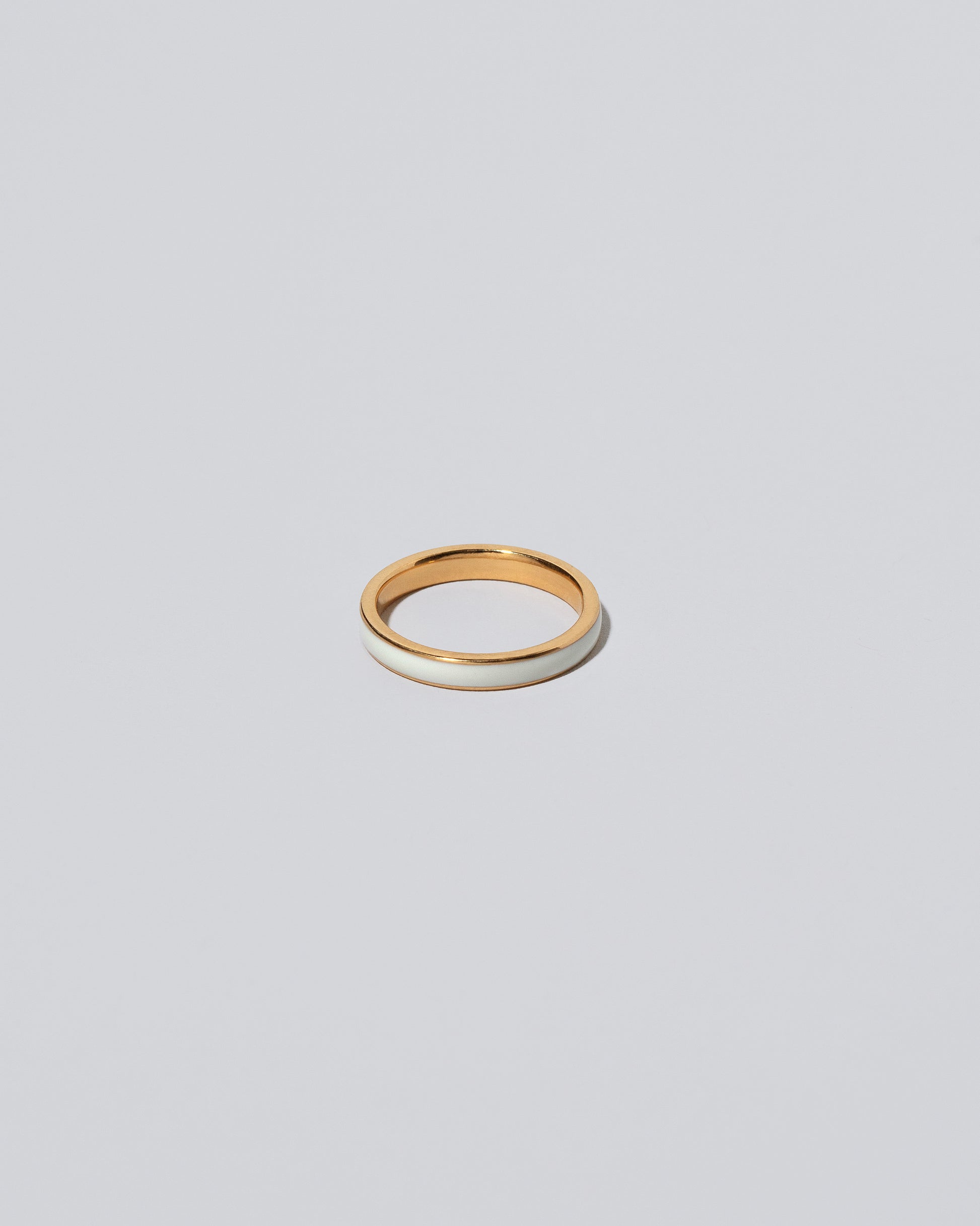 Enamel Band in White Out on light color background.