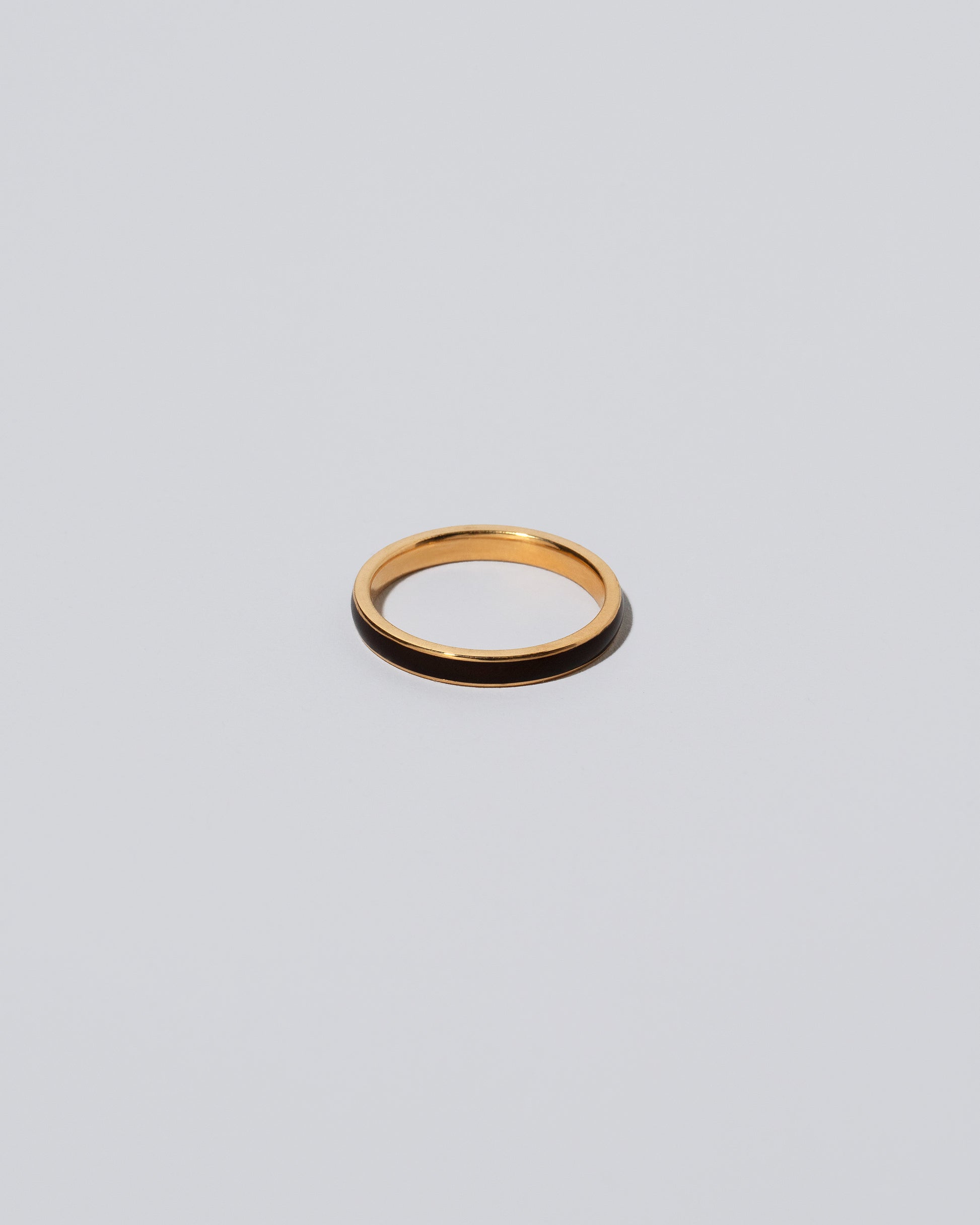 Enamel Band in Ink on light color background.