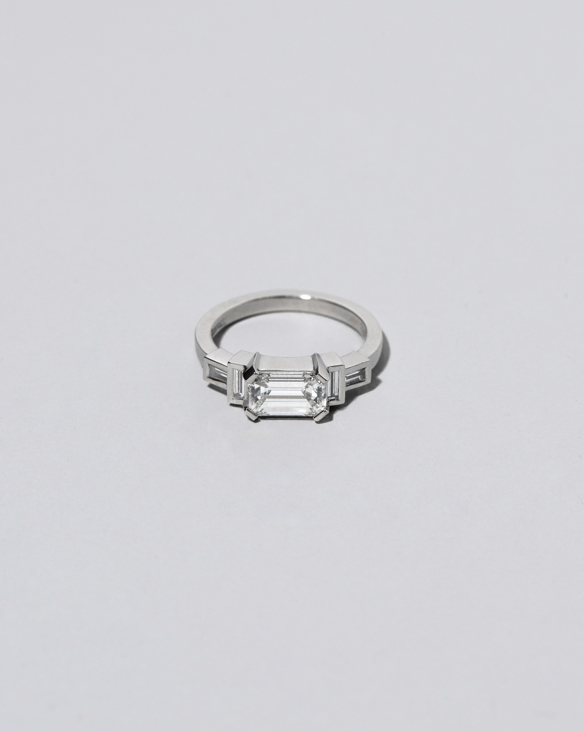 Platinum Diamond Expression Ring on light color background. Please note: This image represents a custom creation.