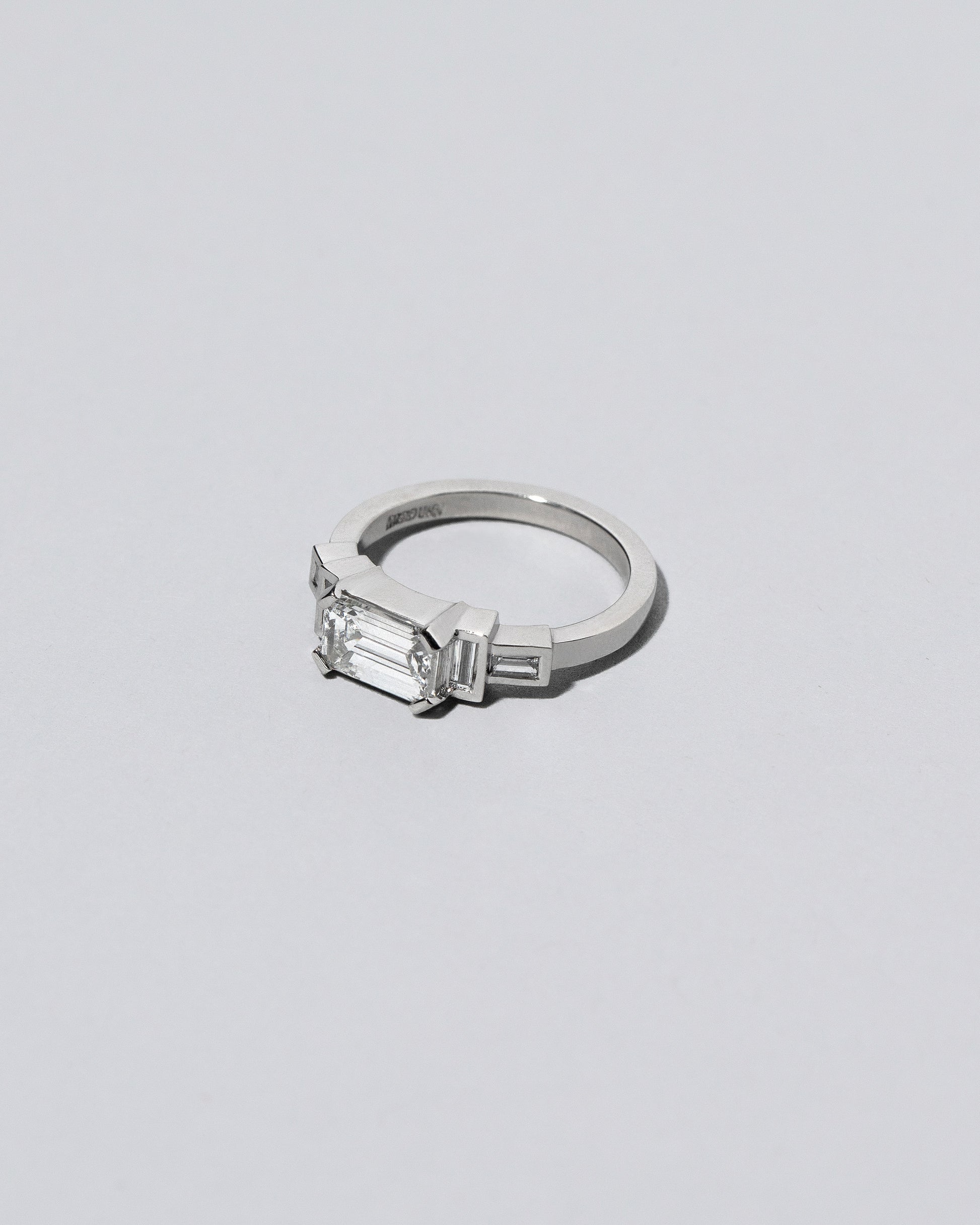 Platinum Diamond Expression Ring on light color background. Please note: This image represents a custom creation.
