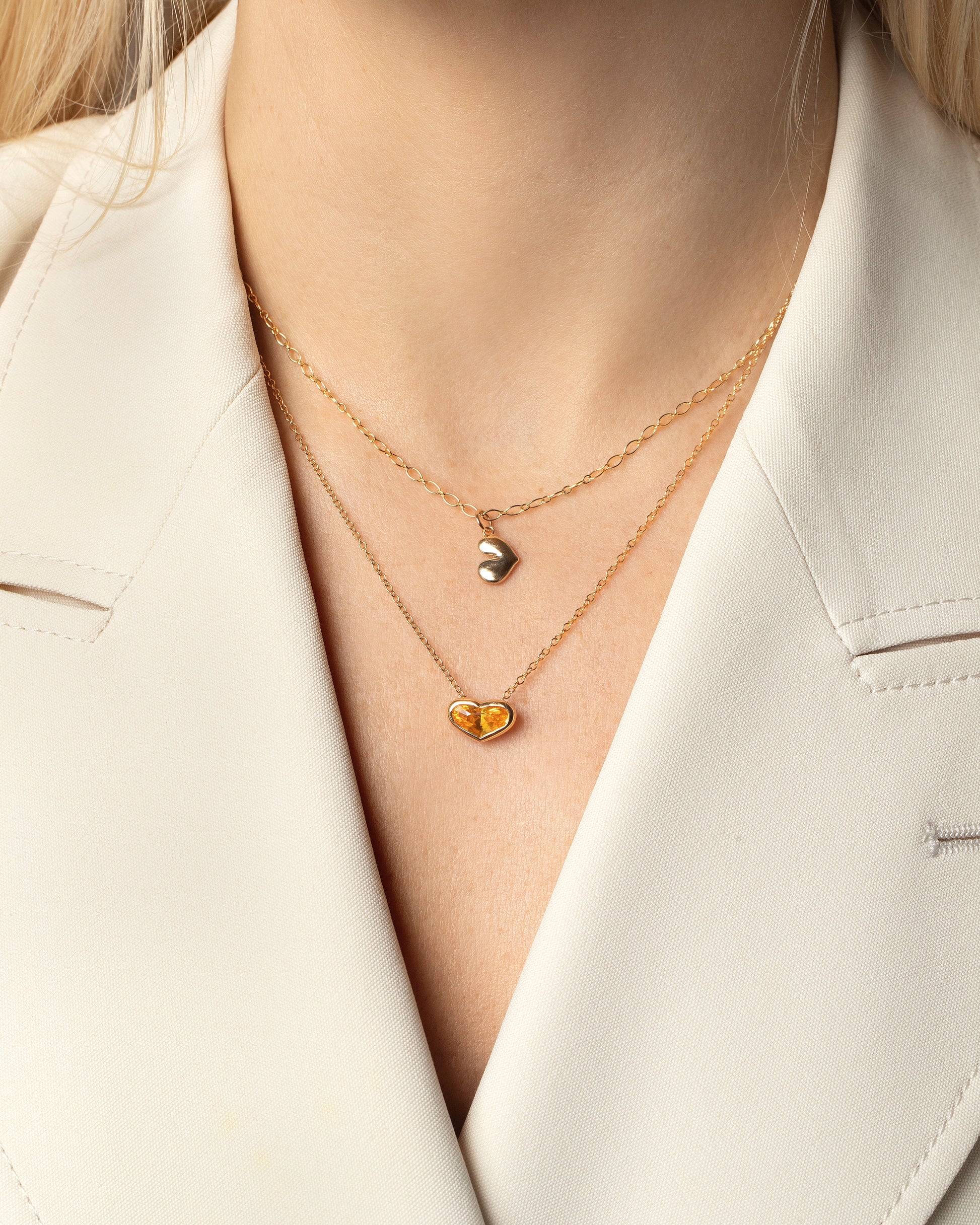 Small Gold Thousand & One Night Heart Charm on model.