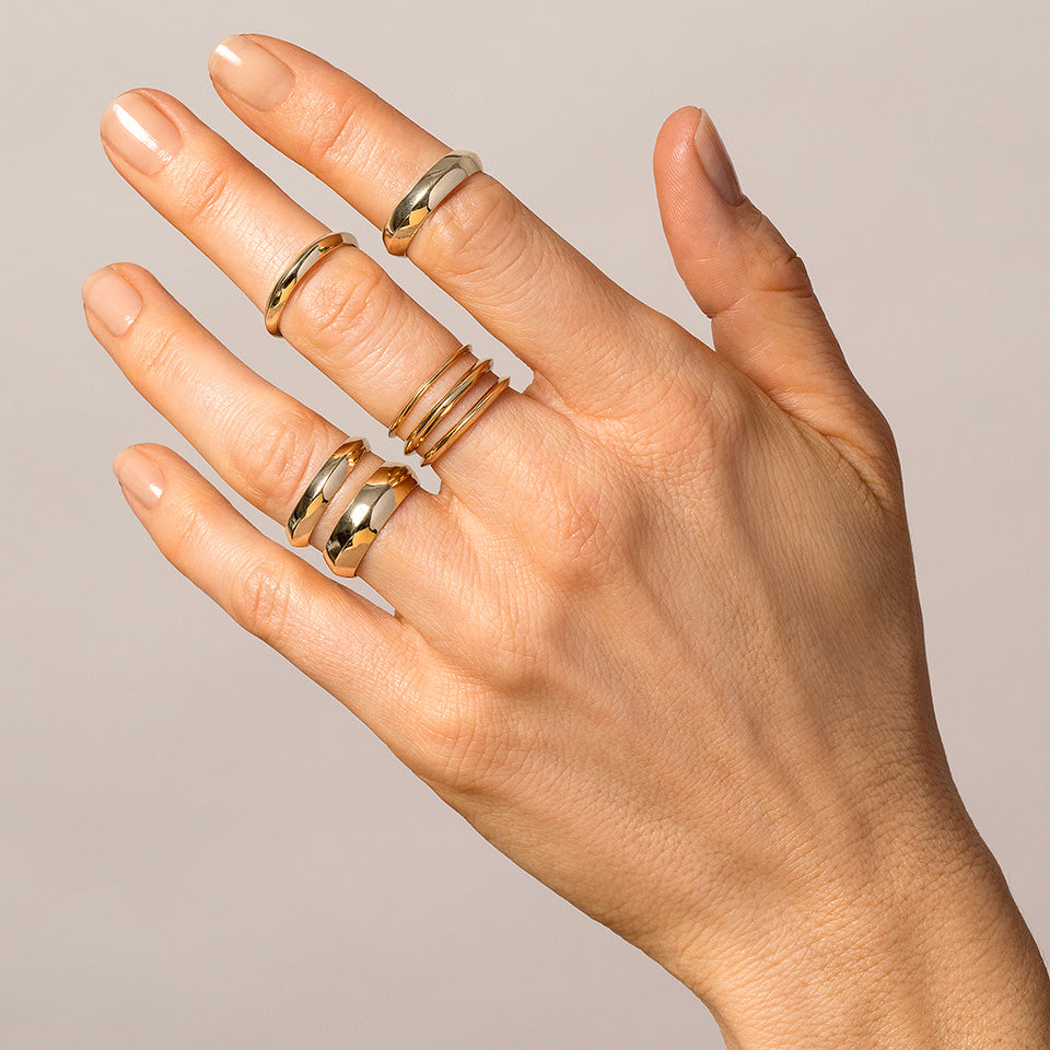 product_details::Gold Knife Edge Bands on model.