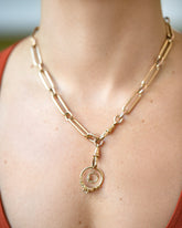 Diamond Luna Ring and Luna Ring Charm paired with the Grand Swivel Fob and Solid Link Necklace on model.