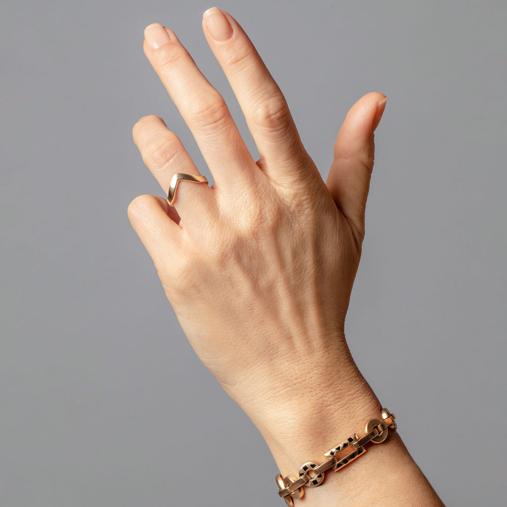 product_details::Gold Wide High Peak Band on model.