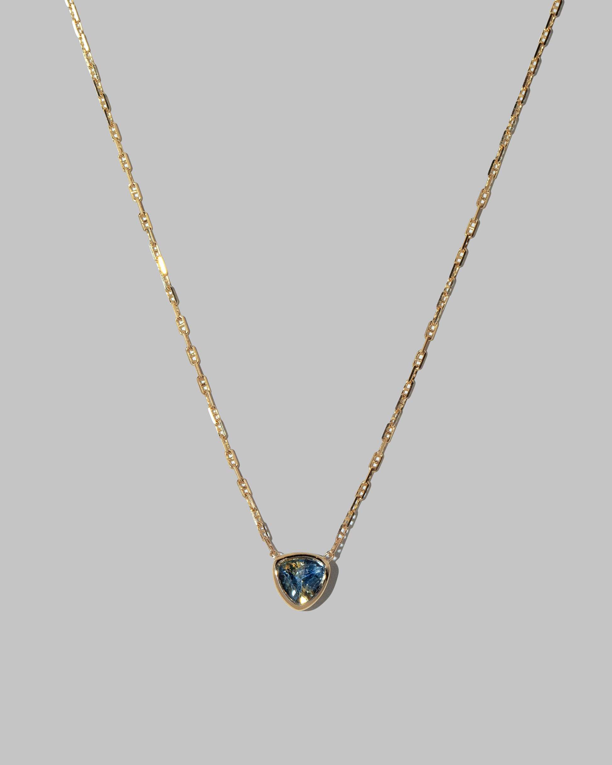 Closeup details of the Northern Lights Necklace 004 on light color background.