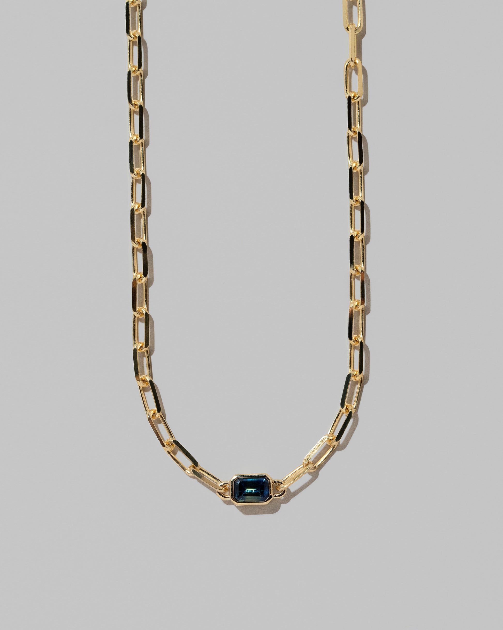 Closeup details of the Northern Lights Necklace 009 on light color background.