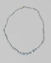 Ula Pearl Necklace 001 on light color background.