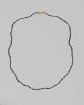 Ula Pearl Necklace 006 on light color background.