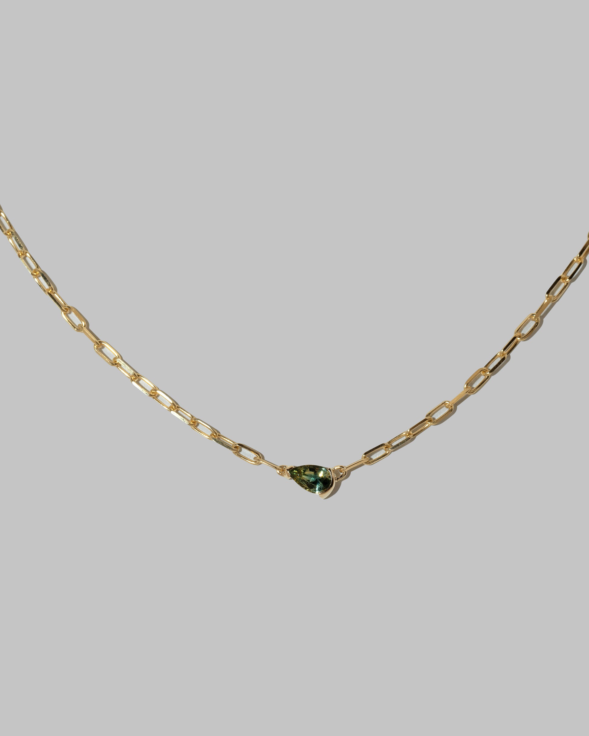 Closeup details of the Northern Lights Necklace 003 on light color background.