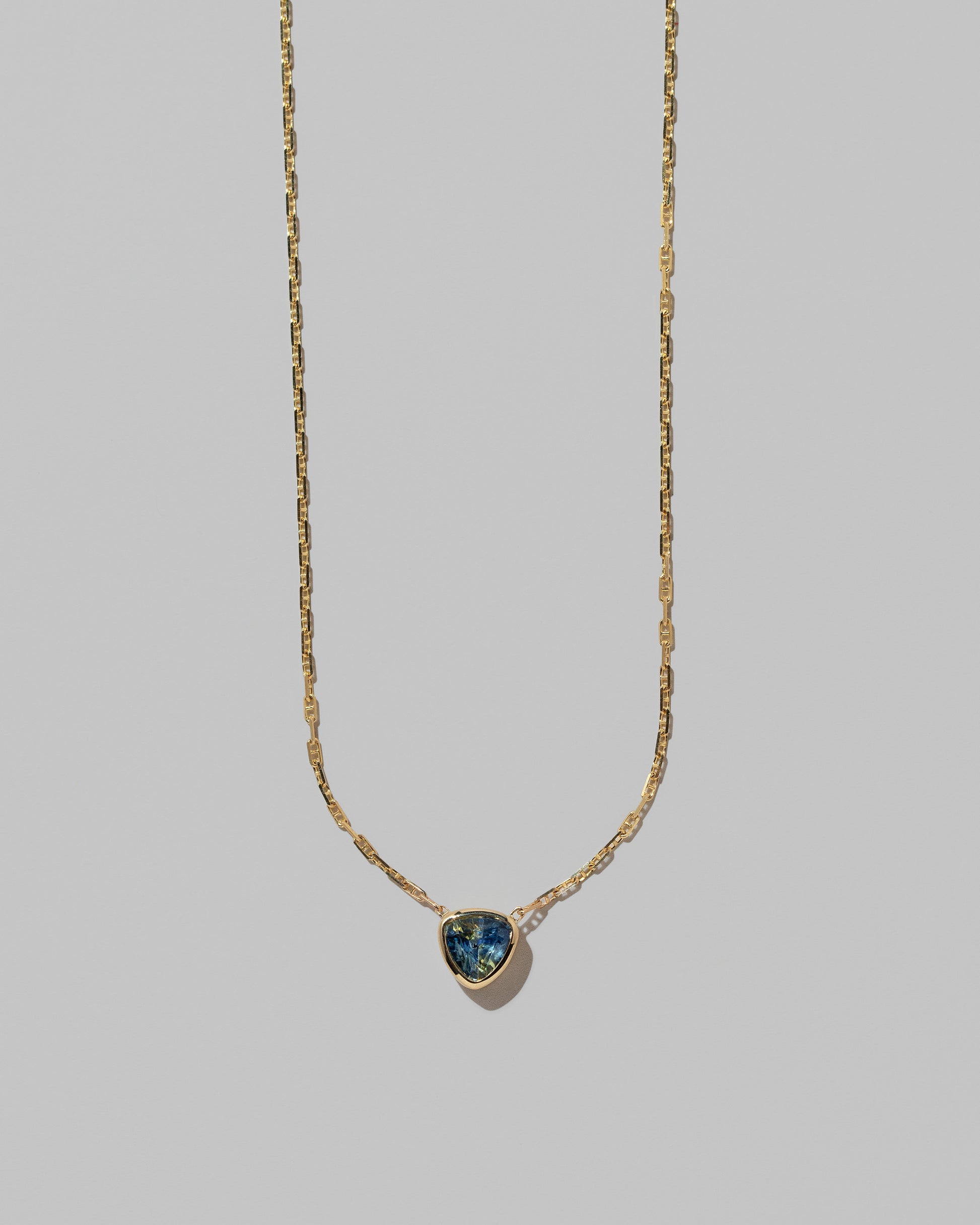 Closeup details of the Northern Lights Necklace 004 on light color background.