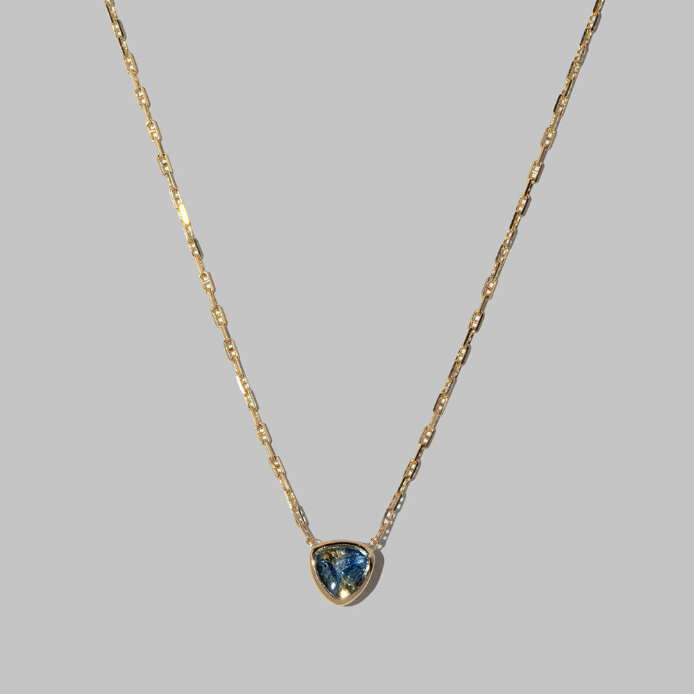 product_details::Closeup detais of the Northern Lights Necklace 004 on light color background.