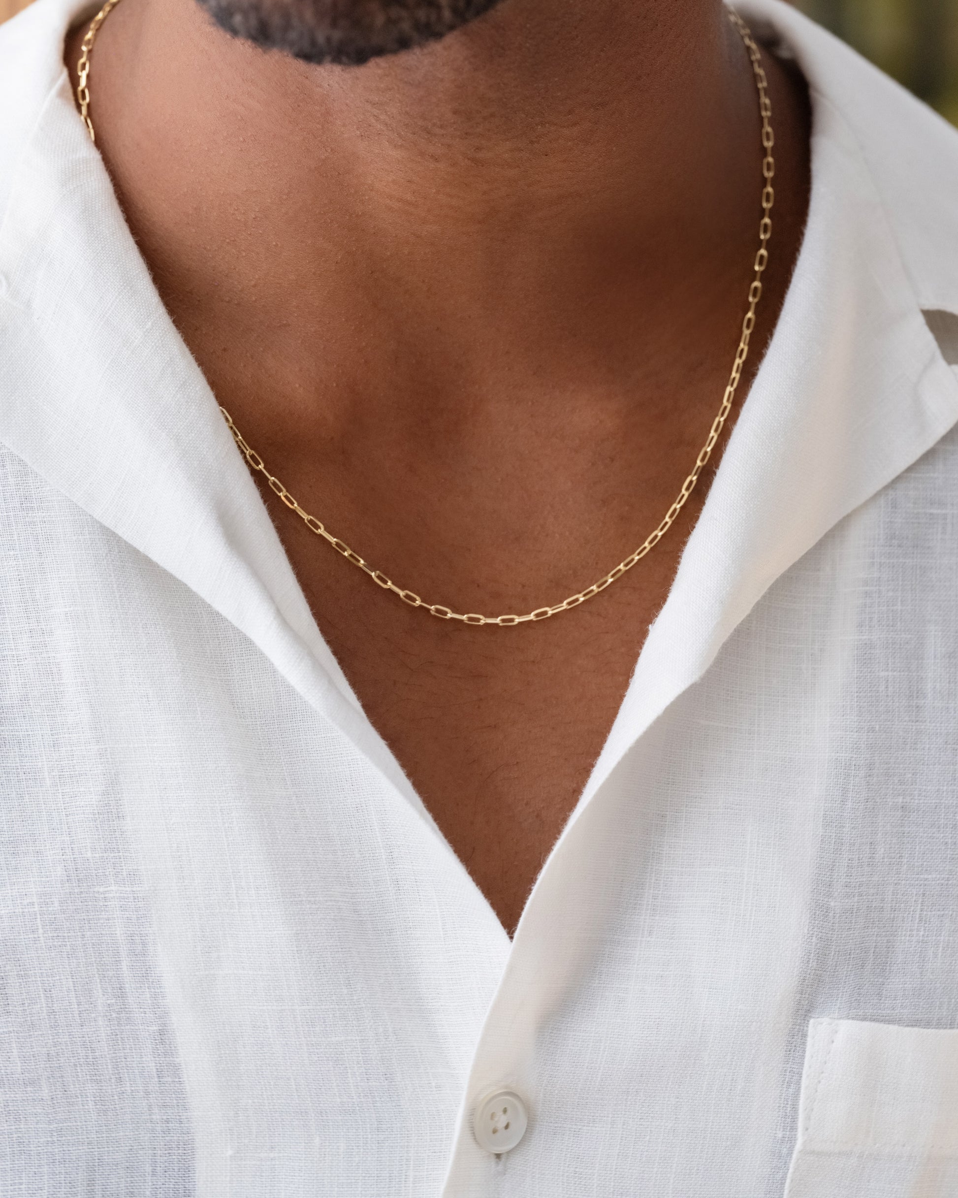 3.5mm Beveled Oval Chain Necklaces on male model.