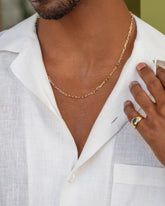 3.5mm Beveled Oval Chain Necklace and Teal Sapphire Jupiter Ring on male model.