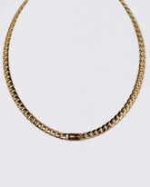 Identity Chain Chrysoberyl Necklace 001 on light color background.