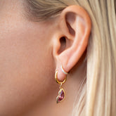 product_details::Pink Lover's Kiss Charm on model.