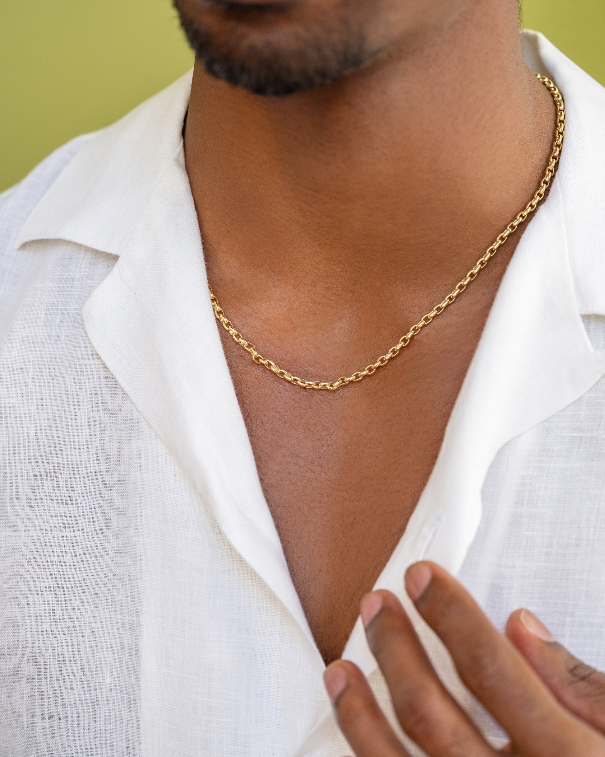 Short Loop Chain Necklace on male model.