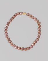 Sugar Pearl Necklace on light color background.