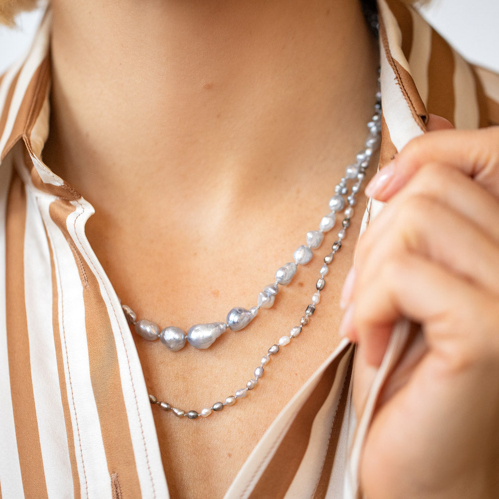 product_details::Ula Pearl Necklace 001 and Ula Pearl Necklace 005 on model.