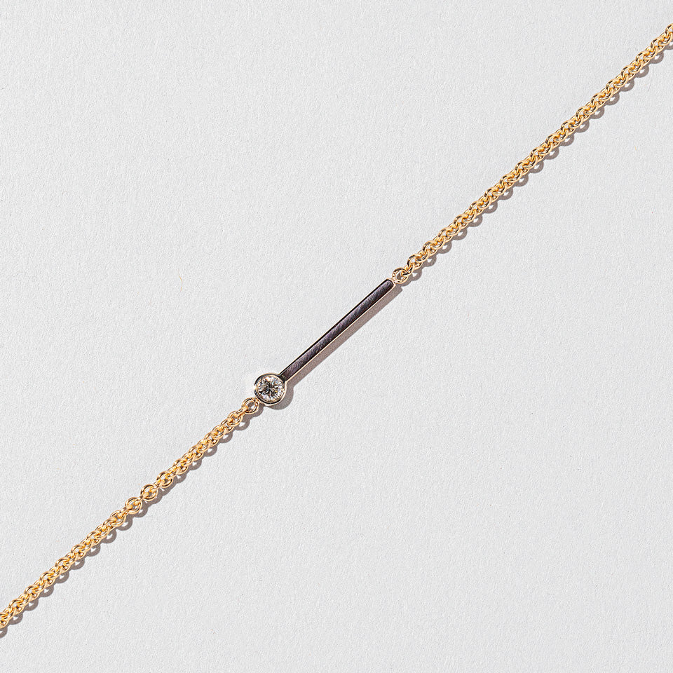 product_details::Closeup details of the Act 3. Bracelet 4 on light color background.