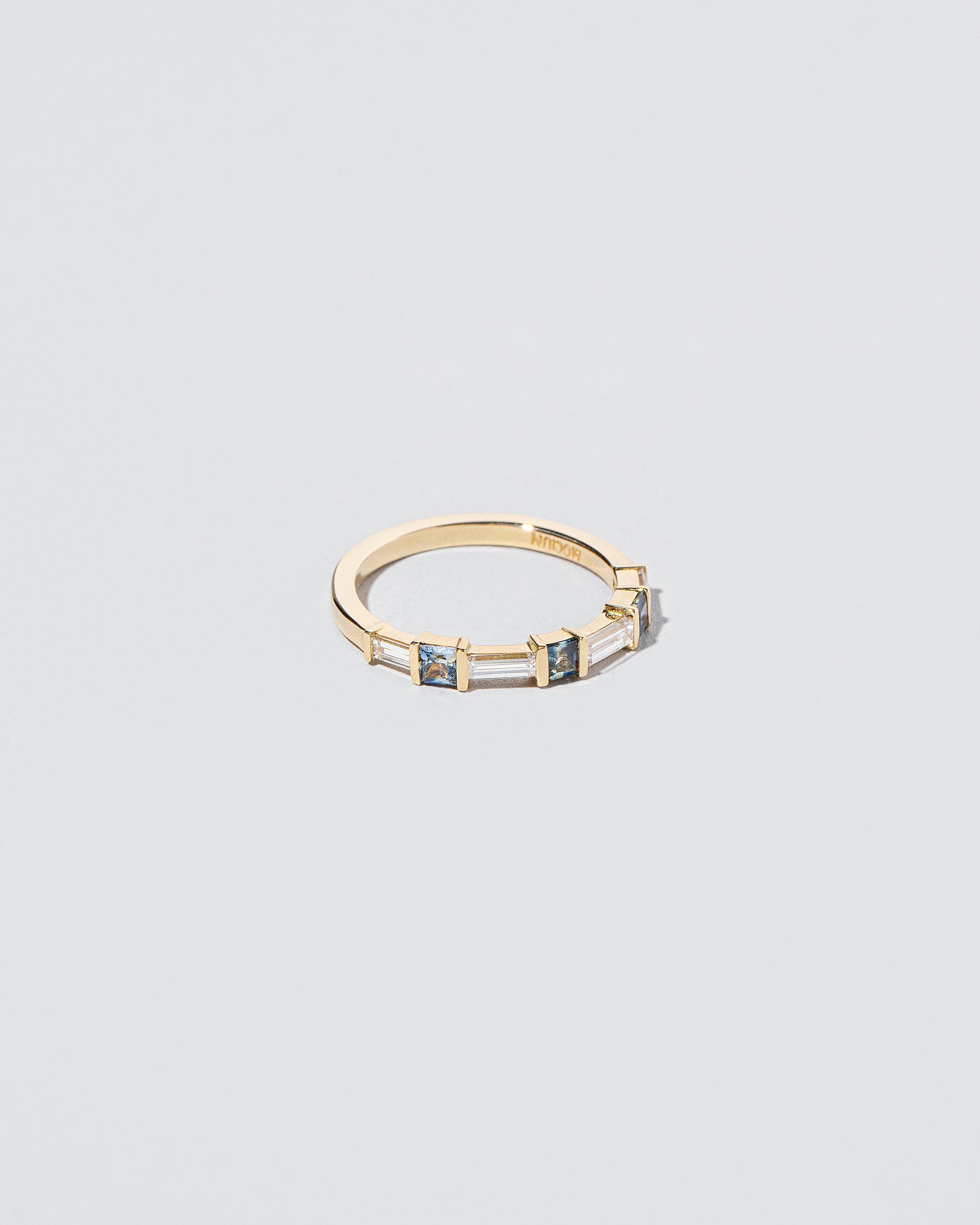 View from the side of the Wayfarer Band on light color background.