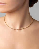 Accumulation Necklace on model.