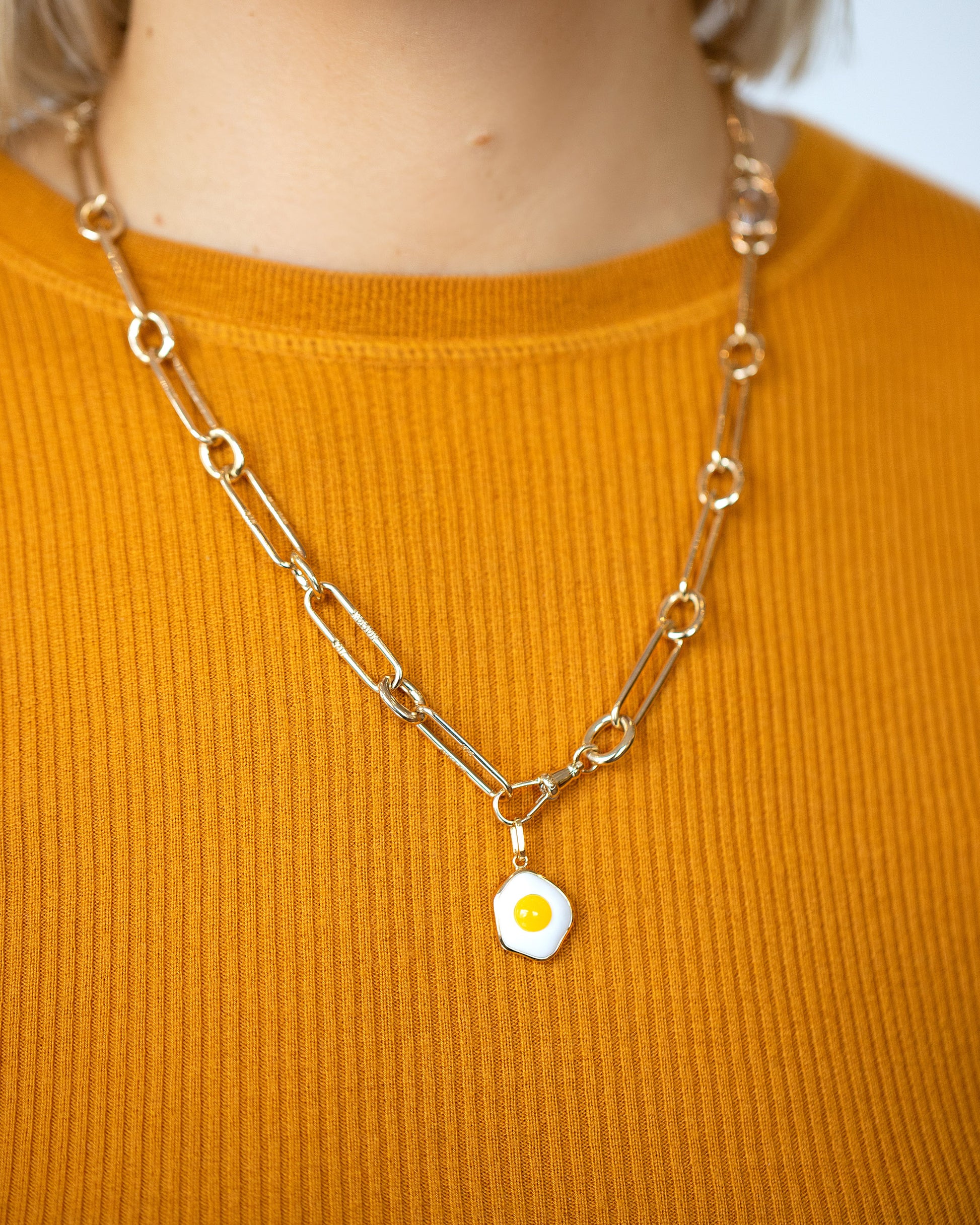 Fried Egg Pendant and Solid Gold Link Necklace on model.