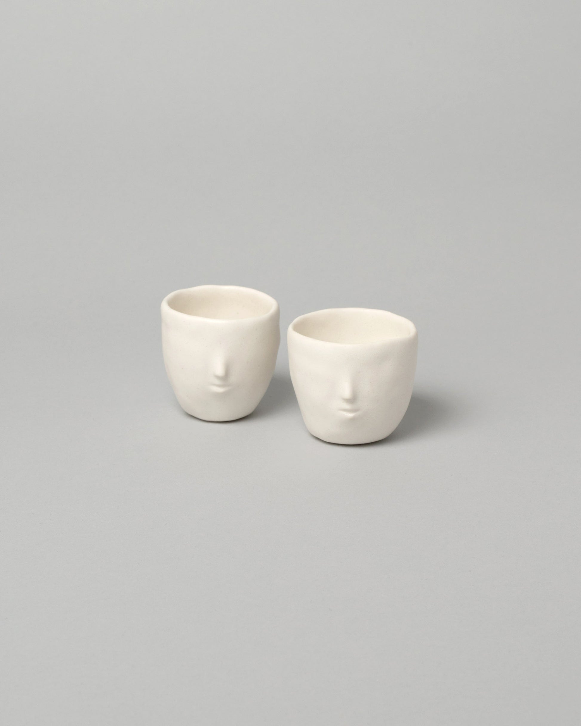 Rami Kim White Soju Cup Set on light color background.