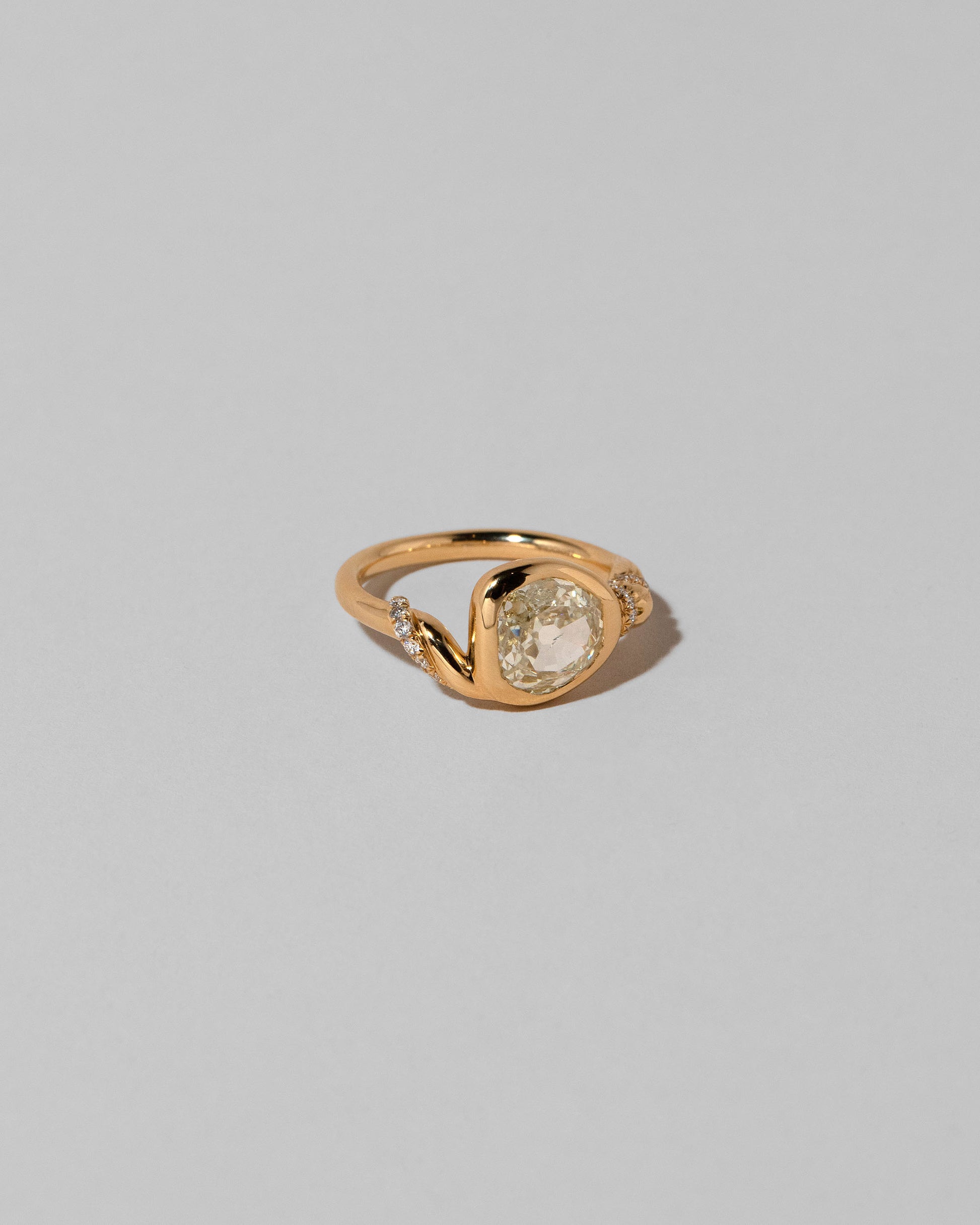 View from the side of the Coil Ring on light color background.