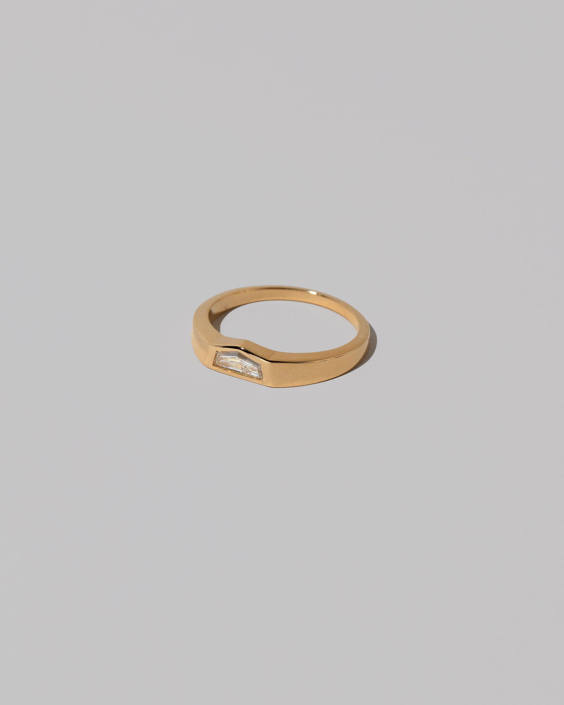 View from the side of the Unit Ring on light color background.