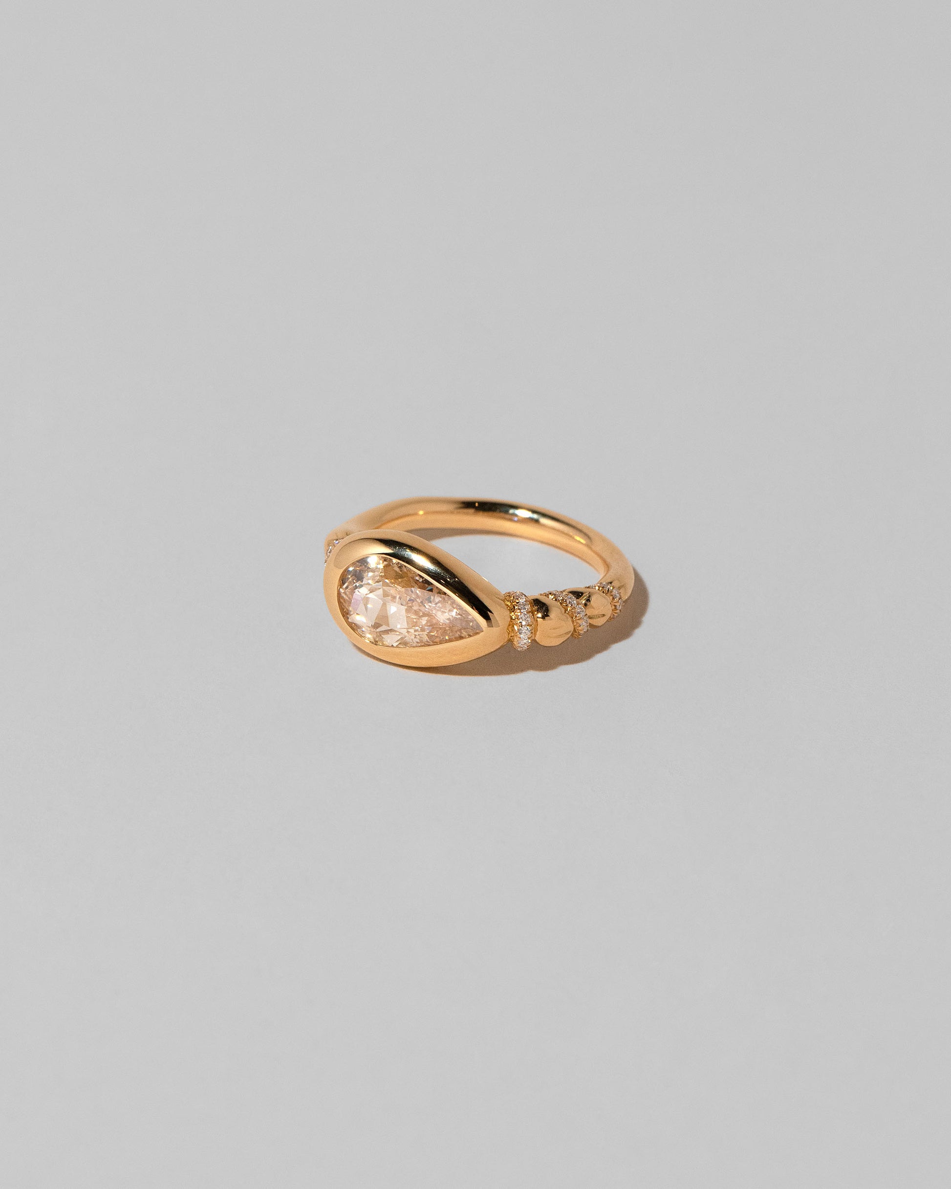 View from the side of the Bind Ring on light color background.